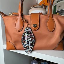 Rep Bag charms and earrings