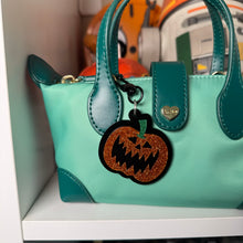 NBC bag charms