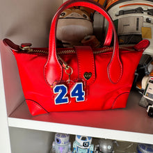 Hockey and Heated rivalry  themed bag charms