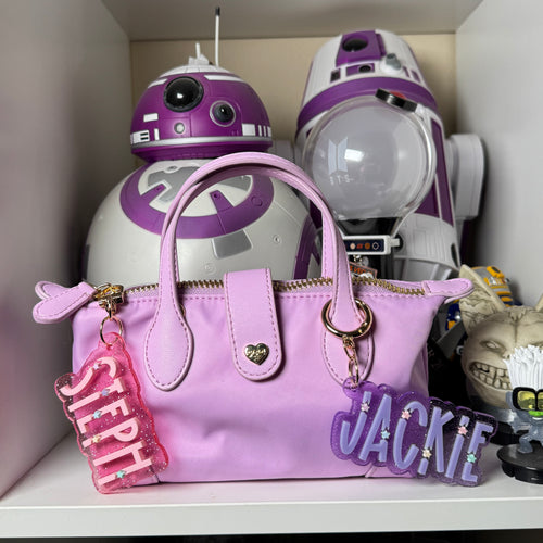 Skinny star name plate bag charm