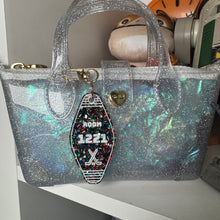 Hockey and Heated rivalry  themed bag charms