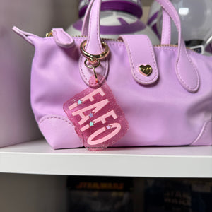 Skinny star name plate bag charm