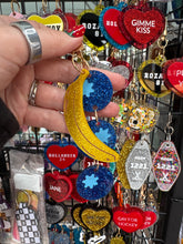 Hockey and Heated rivalry  themed bag charms