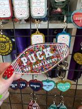 Hockey and Heated rivalry  themed bag charms