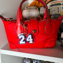 Hockey and Heated rivalry  themed bag charms