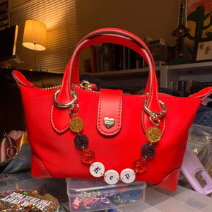 Friendship bracelet bag chain