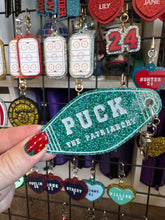 Hockey and Heated rivalry  themed bag charms