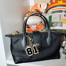 Hockey and Heated rivalry  themed bag charms