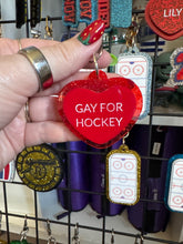 Hockey and Heated rivalry  themed bag charms