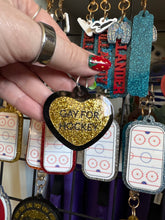 Hockey and Heated rivalry  themed bag charms