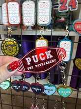 Hockey and Heated rivalry  themed bag charms