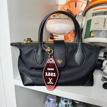 Hockey and Heated rivalry  themed bag charms