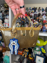 Galactic Hair-oine bag charms!