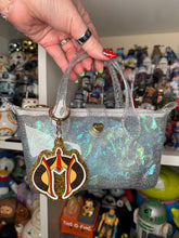 Galactic Hair-oine bag charms!